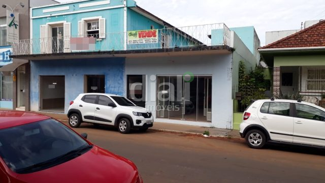 PRÉDIO COMERCIAL NO CENTRO DE COMPRAS COM APARTAMENTOS EM CIMA